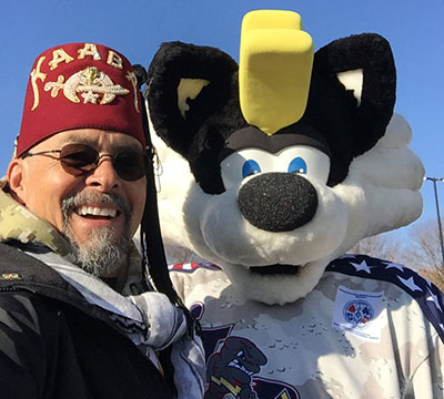 Jose Lao (1Lt Cdr) with Quad City Storm Hockey Mascot